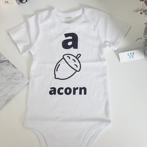 Open image in slideshow, Sebastianwear Baby Bodysuit Short Sleeve Vowel Design Letter &quot;a&quot;
